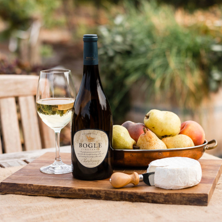 Bottle of white wine sitting on table